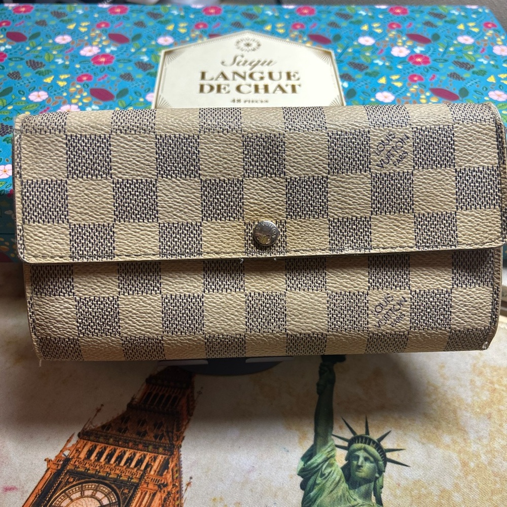Authentic Louis Vuitton Damier Azur Sarah Wallet.